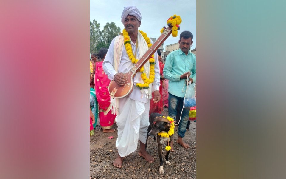 Kumbar with his pet dog in Yamagarani village of Belagavi district.